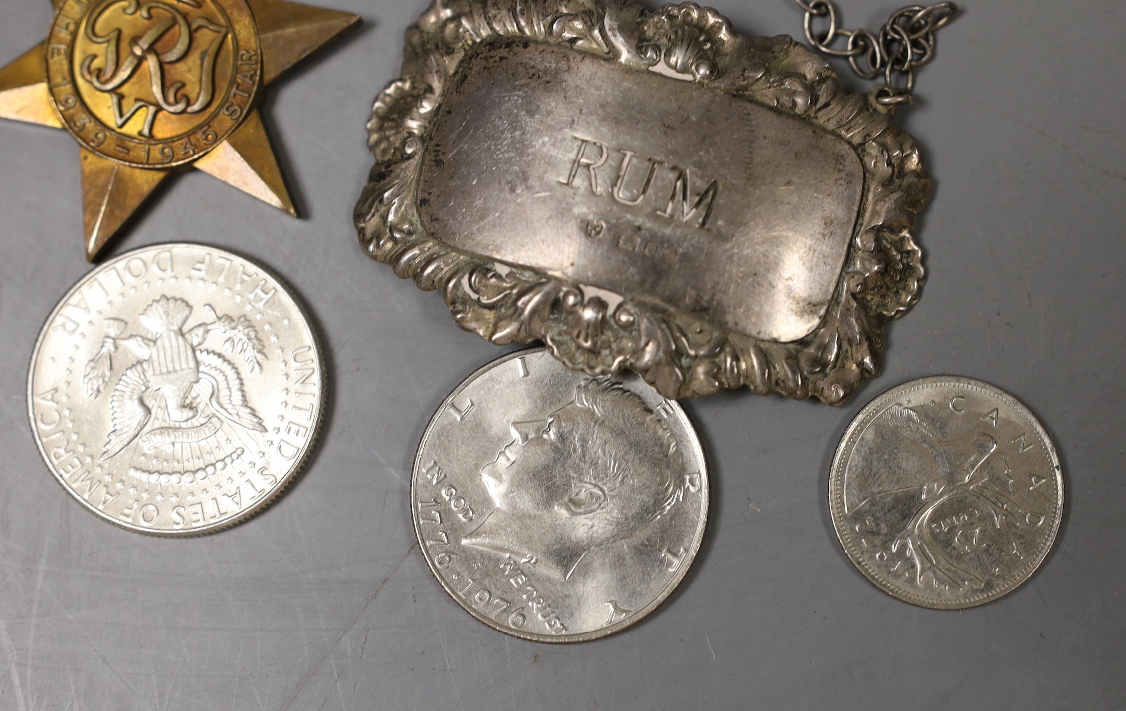 Two silver wine labels, medals, etc.